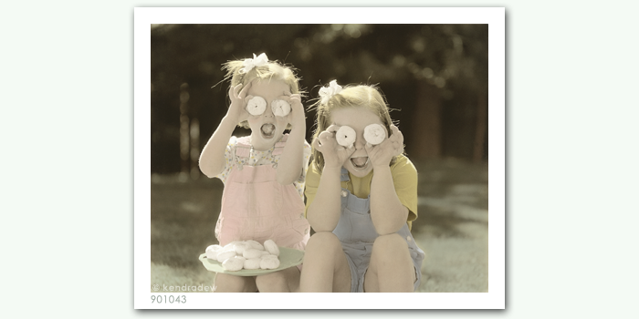 photograph of girls and doughtnuts