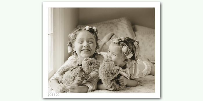 photograph of girls in curlers