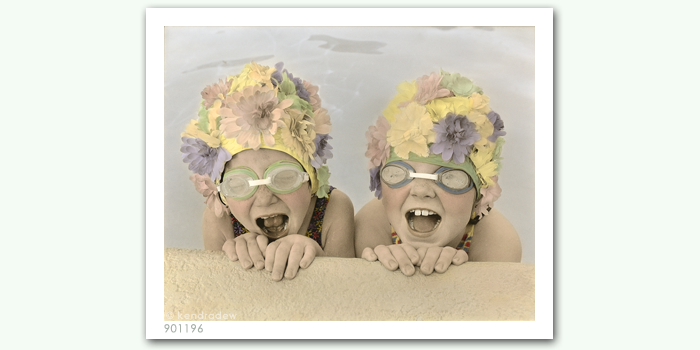 photograph of girls in pool