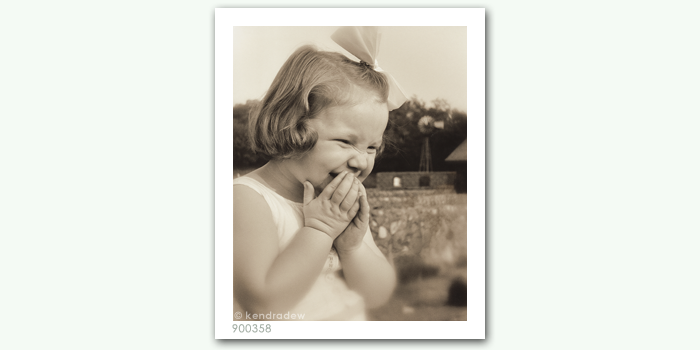 photograph of girl laughing
