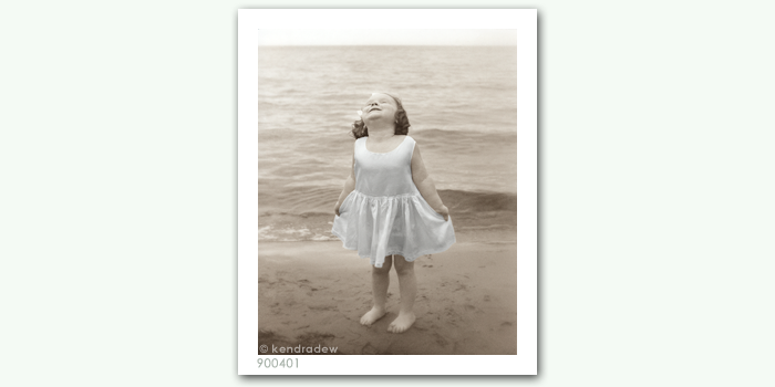 photograph of girl on beach