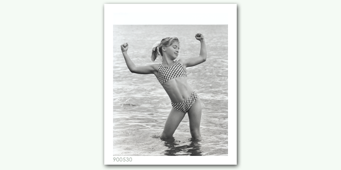 photograph of teenage girl in water