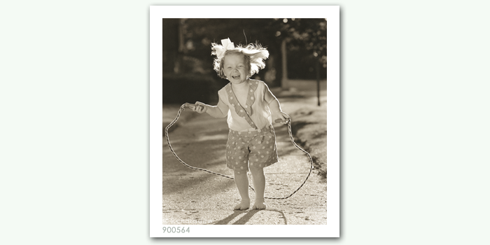 photograph of girl jumping rope