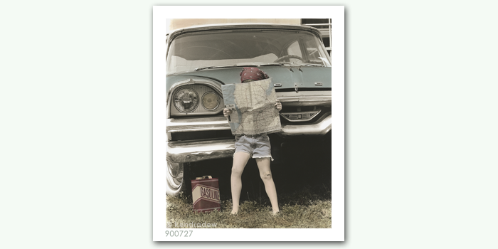 photograph of girl with map