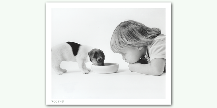 photograph of girl and dog