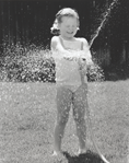 photograph of girl with hose