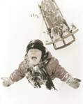 photograph of girl and sled