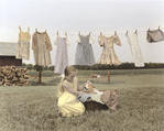 photograph of girl and clothesline