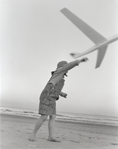 photograph of girl and plane