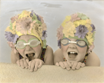 photograph of girls in pool