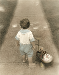 photograph of boy with wagon