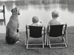 photograph of boys by lake