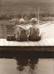 photograph of boys on dock