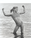 photograph of teenage girl in water