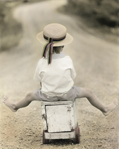 photograph of boy riding truck