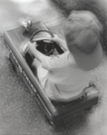 photograph of boy riding truck